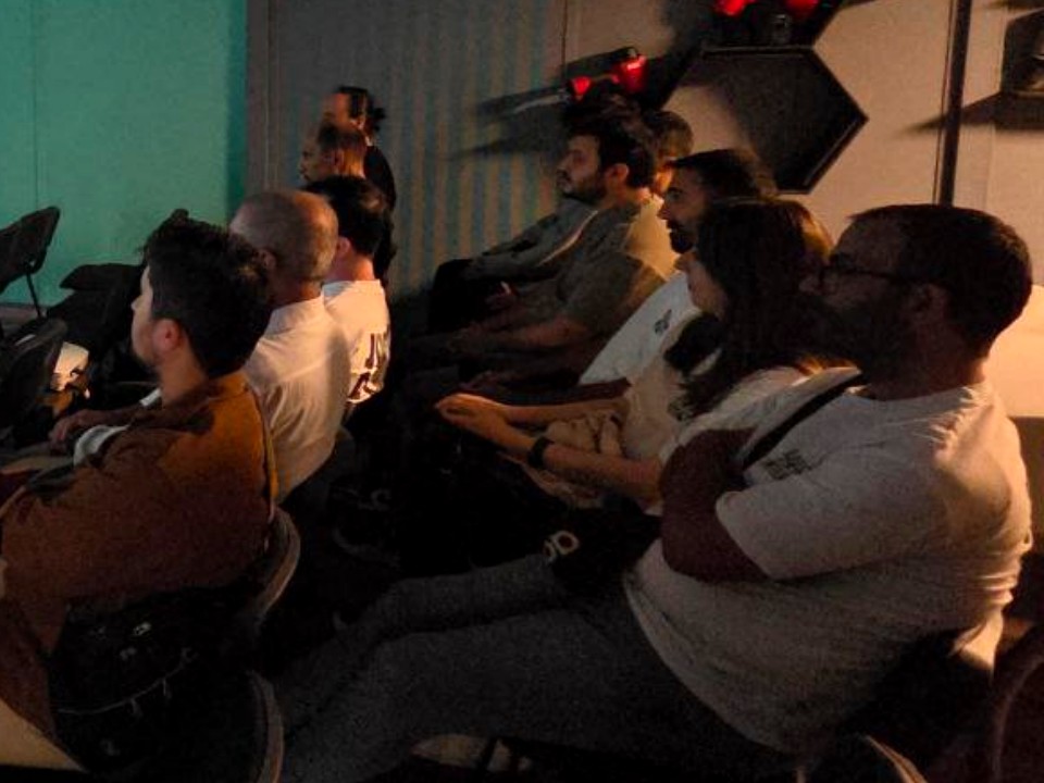 Honeypot Finance Meetup 2025: attendees watching a presentation